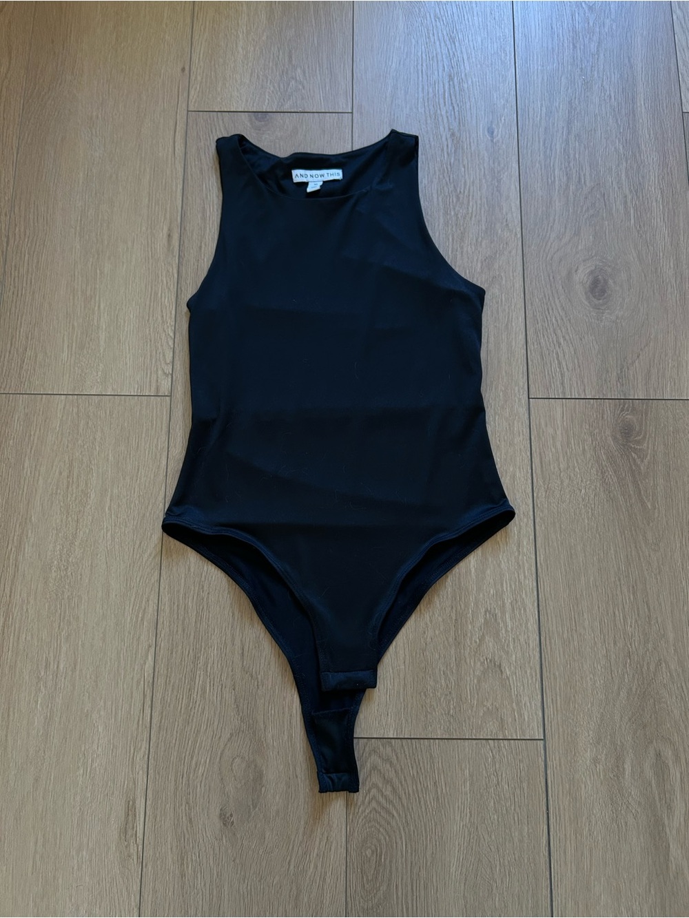 And Now This Black Sleeveless Bodysuit